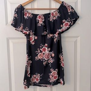 Floral print blouse with ruffled top